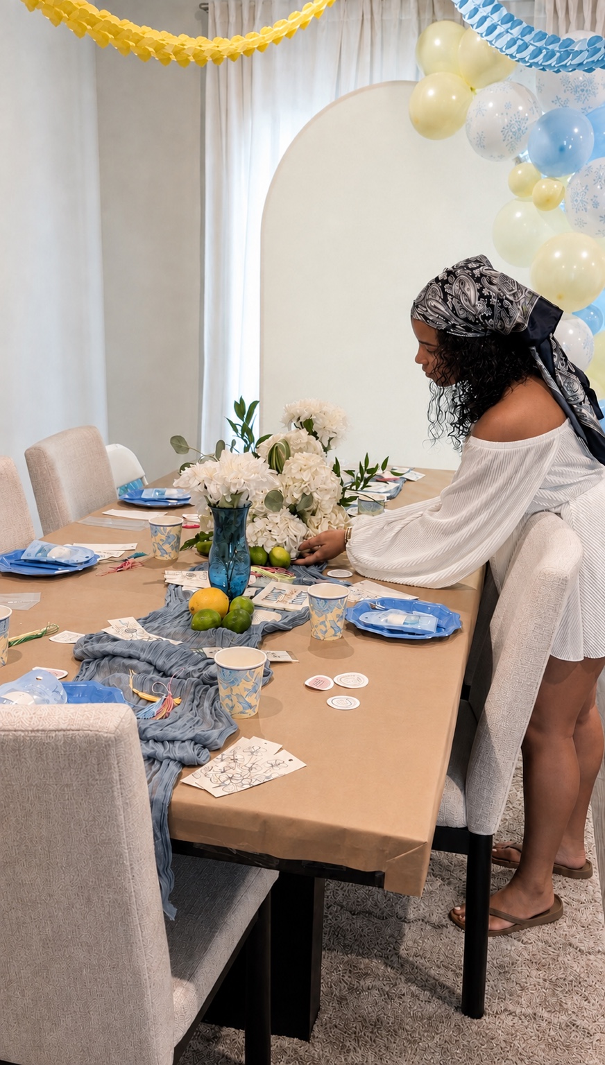 Keirys thoughtfully styling a blue, yellow, and white gathering table for guests